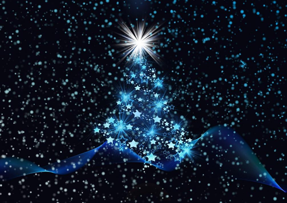 Künstlerisch gestaltete Weihnachtskarte mit einem Christbaum im Schneegestöber.